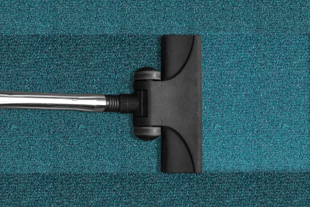 Vacuuming a carpet