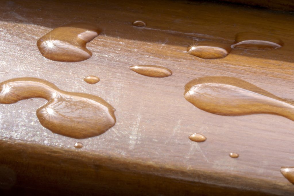 Water drops and spilled drinks on the kitchen table