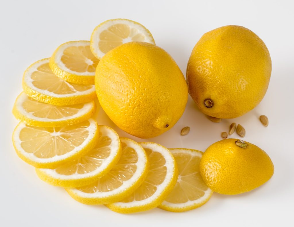 Make a lemon spray for fleas by slicing lemons and steeping them in water.